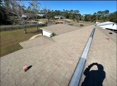 Storm damage roof tarp-and-repair in progress on a Volusia County home